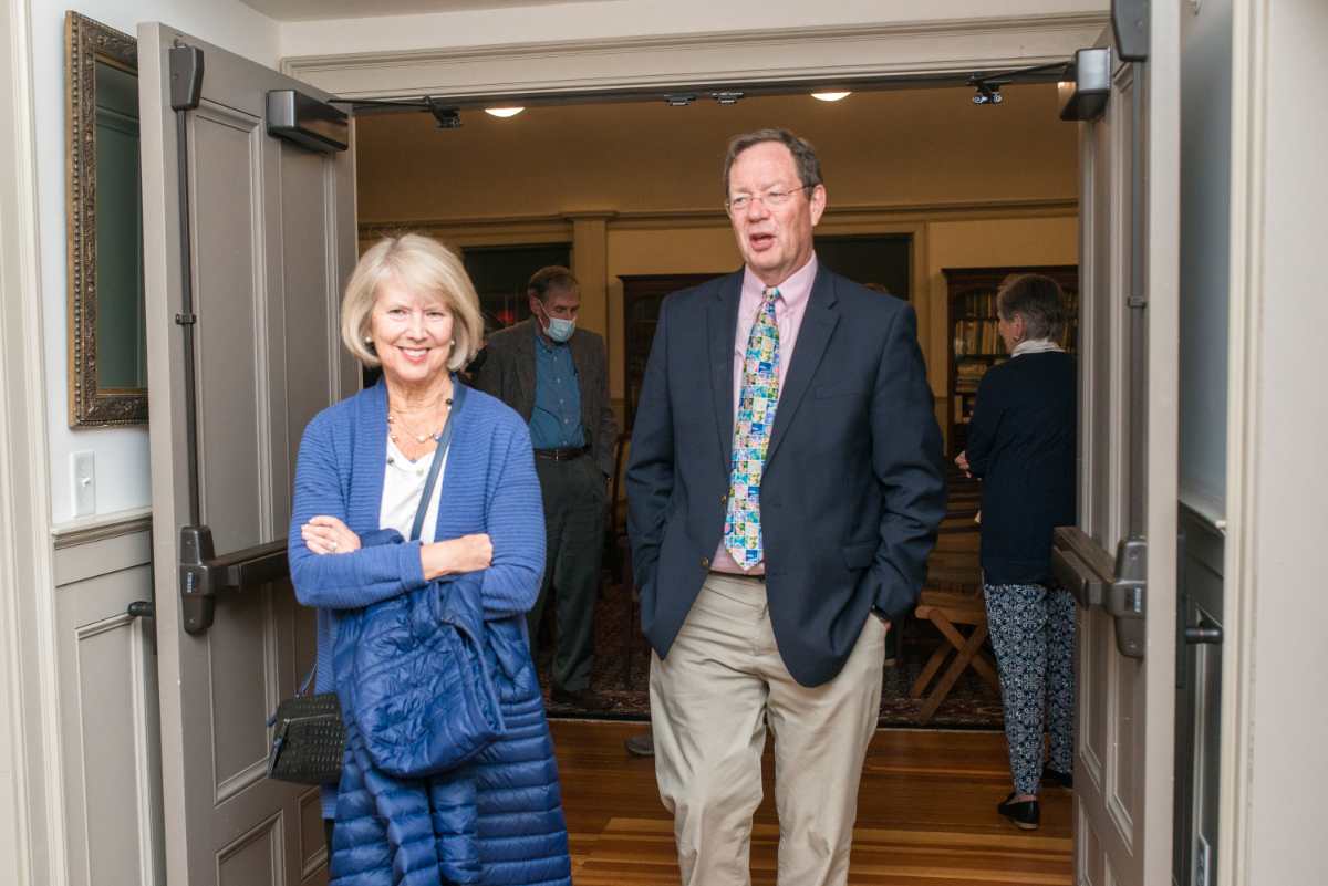Ginger Winslow and Chuck Goodrich chat as they walk toward te post-program reception at the beautiful Hingham Heritage Museum