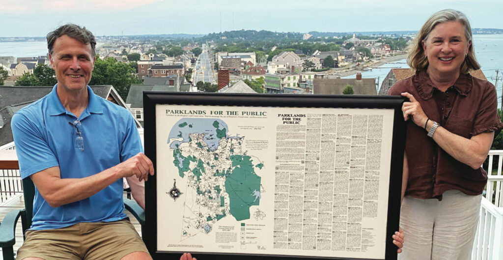 Art-presents-Martha-Falvy-with-Parklands-for-the-Public-map-in-gratitude-for-her-14-years-serving-on-the-HLCT-board.